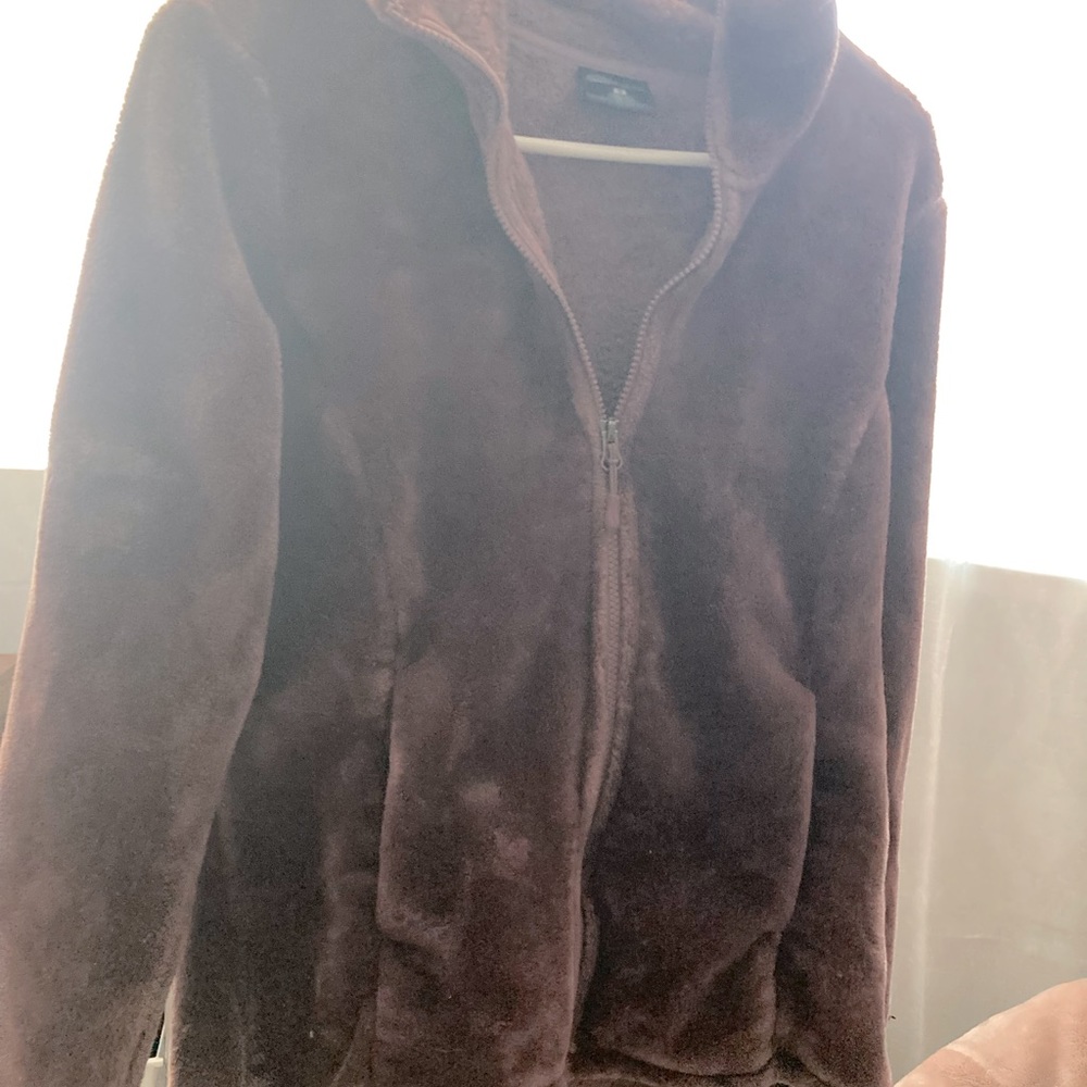 Mauve colored fuzzy both inside and out jacket